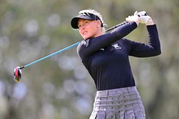 Charley Hull of England plays her shot from the second tee during the final round of the Hilton Grand Vacations Tournament of Champions at Lake Nona Golf & Country Club in Orlando, Fla., on Jan. 22, 2023. (Photo by Julio Aguilar/Getty Images)