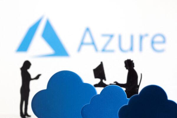 3D printed clouds and figurines are seen in front of the Microsoft Azure cloud service logo in an illustration taken on Feb. 8, 2022. (Dado Ruvic/Illustration/Reuters)