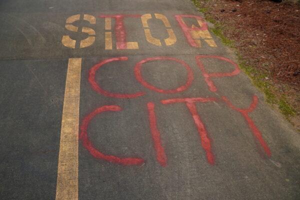 Graffiti reading "Stop Cop City" at the anarchist camp near Atlanta, Ga. on Jan. 23, 2023. (Jackson Elliott/The Epoch Times)