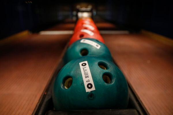 Labelled bowling balls at All Star Lanes bowling alley at Westfield in White City, London, on Aug. 15, 2020. (Hollie Adams/Getty Images)