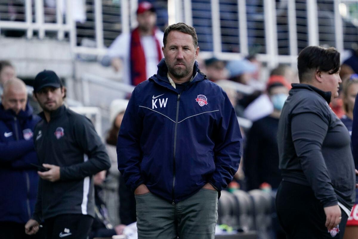 Washington Spirit head coach Kris Ward (C) stands pitch side during the second half of the NWSL Championship soccer match against the Chicago Red Stars in Louisville, Ky., on Nov. 20, 2021. (Jeff Dean/AP Photo)