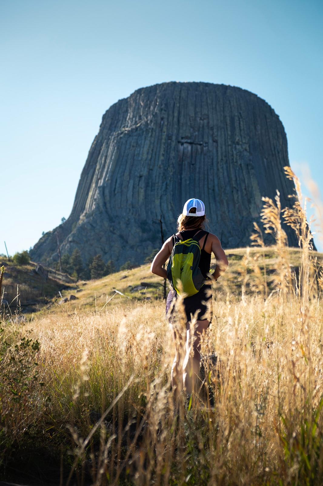 Hiking the base of Devils Tower National Monument. (Benjamin Myers/TNS)