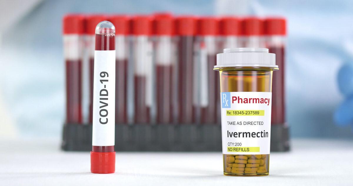 An ivermectin bottle next to a positive blood sample of COVID-19. (Novikov Aleksey/Shutterstock)