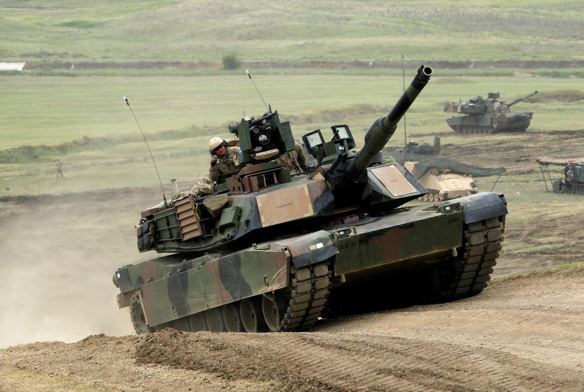 U.S. M1A2 "Abrams" tank moves to firing positions during U.S. led joint military exercise "Noble Partner 2016" near Vaziani, Georgia, on May 18, 2016. (David Mdzinarishvili/Reuters)