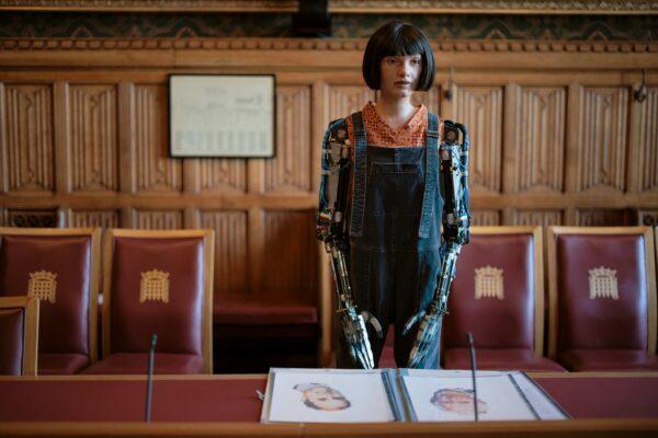 Ai-Da Robot, the world's first ultra-realistic humanoid robot artist, appears at a photo call in a committee room in the House of Lords in London on Oct. 11, 2022. (Rob Pinney/Getty Images)