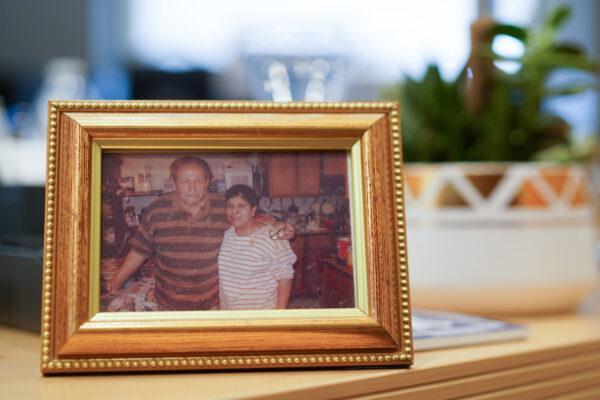 A picture of the parents of George Serrano on his desk in his office in the Town of Wallkill, N.Y., on Jan. 11, 2023. (Cara Ding/The Epoch Times)