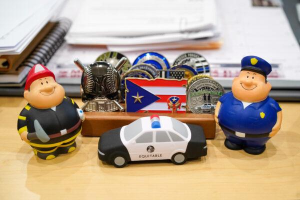 Minifigures of first responders on the desk of Supervisor George Serrano's office in the Town of Wallkill, N.Y., on Jan. 11, 2023. (Cara Ding/The Epoch Times)