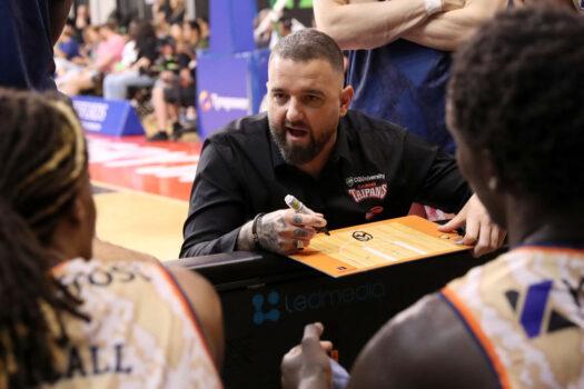 Adam Forde, Coach of the Taipans speaks to players during the round 17 NBL match between South East Melbourne Phoenix and Cairns Taipans at State Basketball Centre in Melbourne, Australia on Jan. 25, 2023. (Kelly Defina/Getty Images)