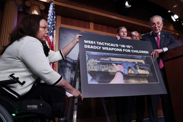 Senate Majority Leader Chuck Schumer (D-N.Y.) (R) joins other Democrats to condemn WEE1 Tactical's "JR-15" rifle being marketed to children. Also pictured at the Capitol press conference in Washington on Jan. 26, 2023, are (L-R) Sen. Tammy Duckworth (D-Ill.), Sen. Richard Blumenthal (D-Conn.), and Sen. Alex Padilla (D-Calif.). (Photo by Win McNamee/Getty Images)
