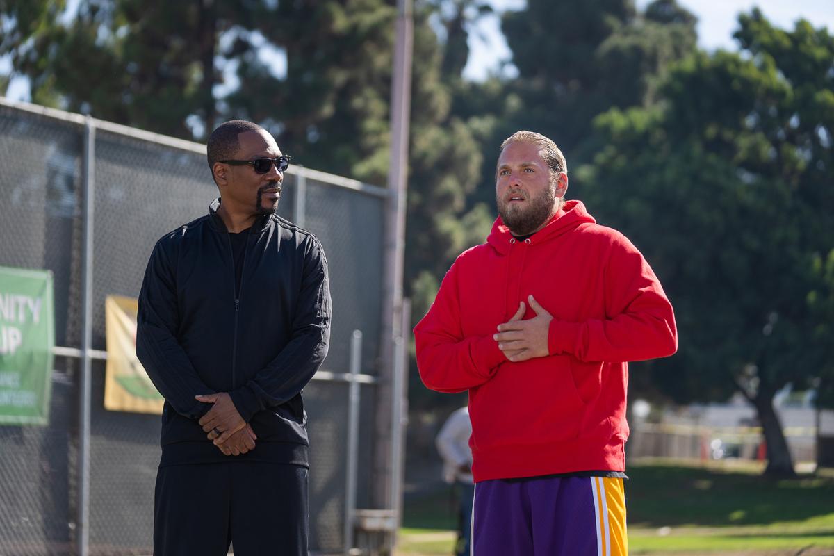 Akbar (Eddie Murphy, L) and Ezra (Jonah Hill) get ready to play some basketball, in "You People." (Netflix)