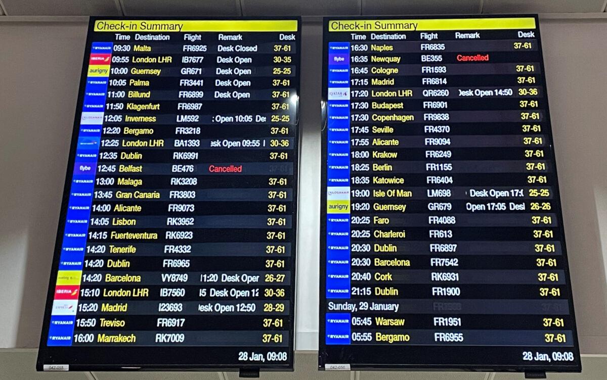 The departure boards showing two cancelled Flybe flights as the regional carrier has ceased trading and all scheduled flights have been cancelled, at Manchester Airport on Jan. 28, 2023. (Peter Byrne/PA Media)