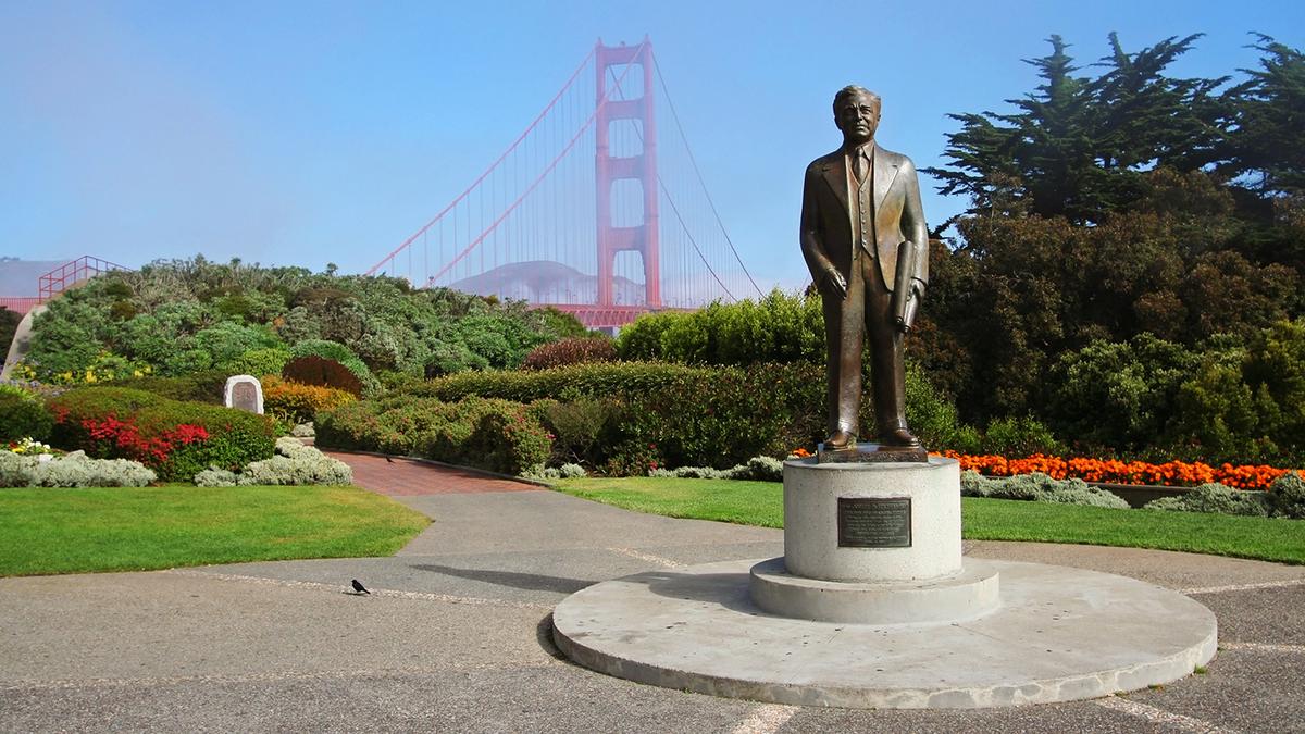 Statue of engineer Joseph B. Strauss with the Golden Gate Bridge in the background. (Blanscape/Shutterstock)