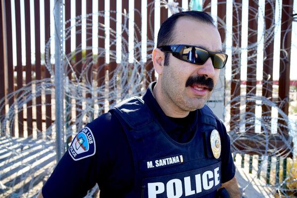 San Luis, Ariz., Police Lt. Marco Santana said there have been many deaths at the southern border wall in San Luis in recent months as he inspects it on Jan. 27, 2023. (Allan Stein/The Epoch Times)