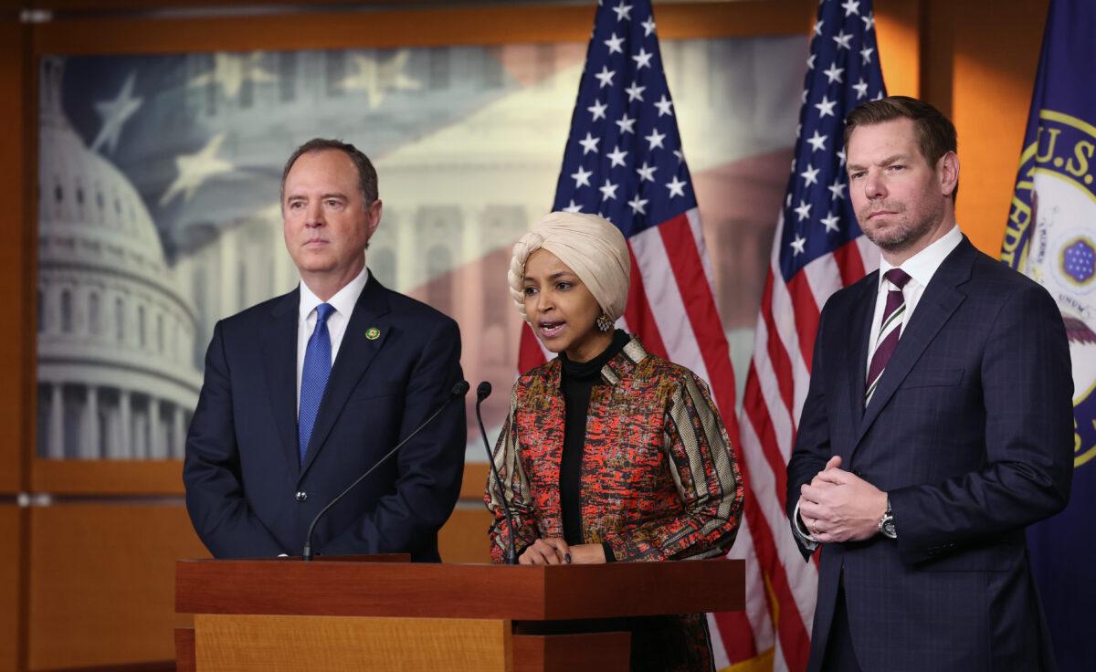 U.S. Rep. Ilhan Omar (D-MN) (C), joined by Rep. Eric Swalwell (D-CA) (R) and Rep. Adam Schiff (D-CA), speaks at a press conference on committee assignments for the 118th U.S. Congress, at the U.S. Capitol Building in Washington on Jan. 25, 2023. (Kevin Dietsch/Getty Images)