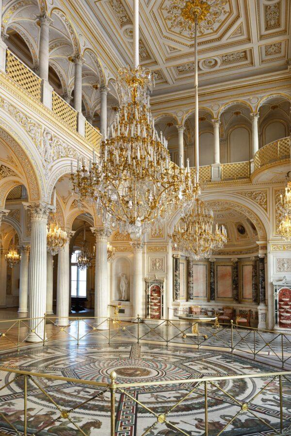 Located in the Small Hermitage, this is one of the most opulent rooms in the complex. The Pavilion Hall, designed by Andrei Stackenschneider in 1858, combines Gothic, Oriental, and Renaissance elements. Crystal chandeliers are found throughout the room, supported by white marble columns and gilded stucco ceilings and walls. The mosaic set on the floor is a copy of an ancient Roman mosaic. (Popova Valeriya/Shutterstock)