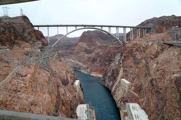 The Colorado River, pictured on Jan. 16, 2023, supplies millions of gallons of water each day to drive the hydroelectric turbines at Hoover Dam. (Allan Stein/The Epoch Times)