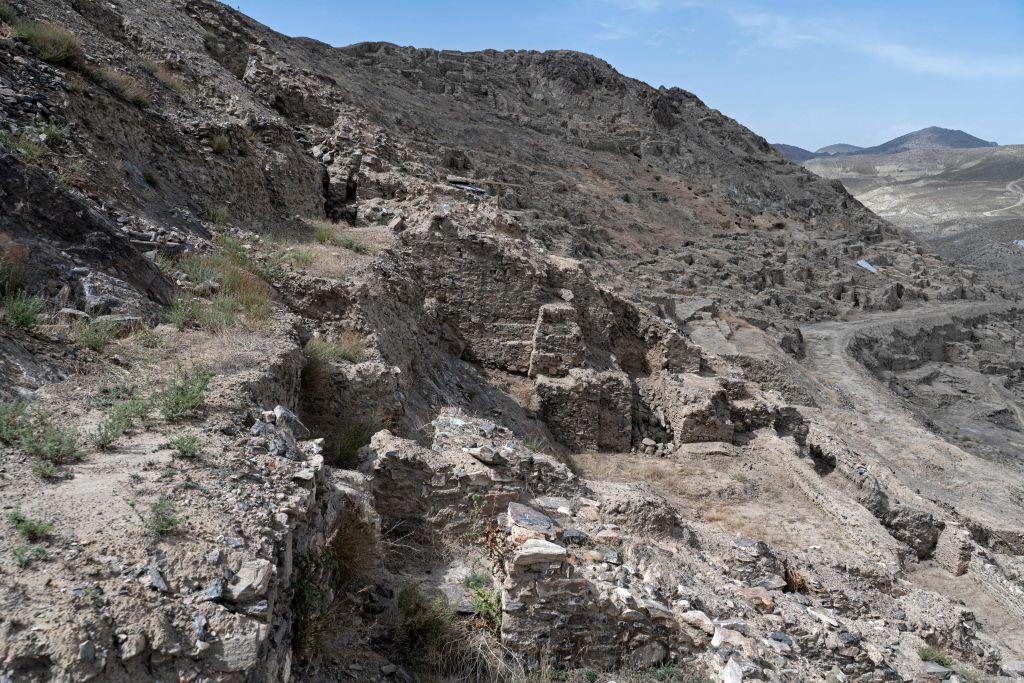 This photograph taken on May 17, 2022, show an archaeological site in Mes Aynak, in the eastern province of Logar. - An ancient Buddhist city carved out of immense peaks near Kabul is in danger of disappearing forever, swallowed up by a Chinese consortium exploiting one of the world's largest copper deposits. (Wakil Kohsar/AFP via Getty Images)