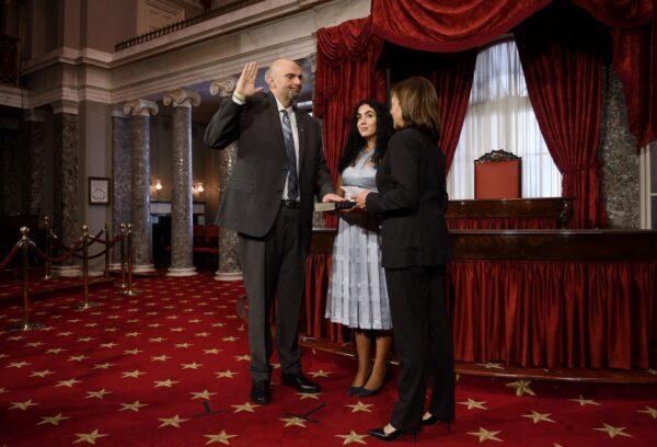 U.S. Vice President Kamala Harris ceremonially swears in U.S. Senator John Fetterman, Democrat of Pennsylvania, for the 118th Congress in the Old Senate Chamber at the Capitol in Washington, DC, Jan. 3, 2023. At center is Fetterman's wife, Gisele Barreto Fetterman. (Olivier Douliery/AFP via Getty Images)