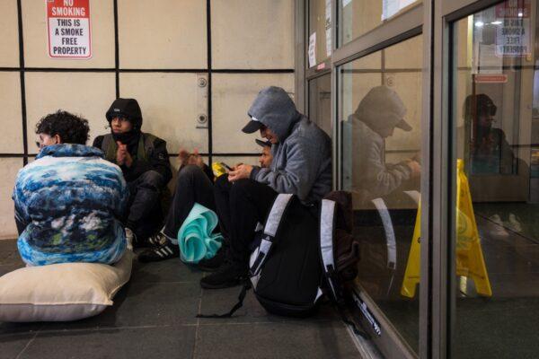  Illegal immigrants camp out in front of the Watson Hotel after being evicted in New York City on Jan. 30, 2023. (Michael M. Santiago/Getty Images)