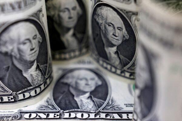 U.S. dollar banknotes on July 17, 2022. (Dado Ruvic/Illustration/Reuters)