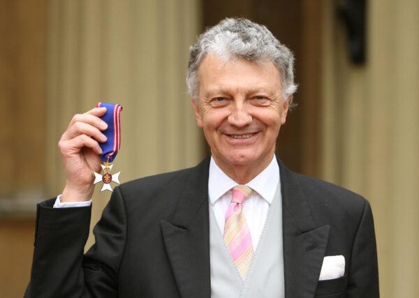 Sir William Shawcross with his Commander of the Royal Victorian Order medal at Buckingham Palace in London, on March 10, 2011. (Dominic Lipinski-WPA Pool/Getty Images)