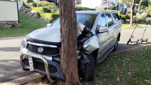 A vehicle allegedly stolen and driven into a tree along Centennial Street, Underwood, in Brisbane, Australia, taken on Dec. 15, 2022. (Courtesy of an Underwood resident)