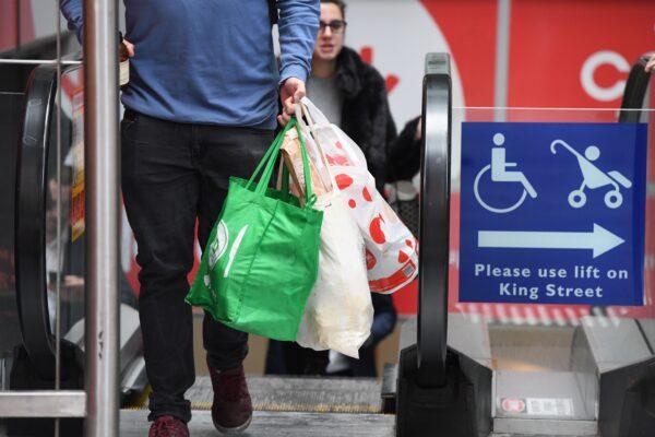 Coles Sydney CBD store, Sydney, Monday, July 2, 2018. Woolworths says it will hand out free reusable bags for the next 10 days as its customers get used to its ban on single-use plastic bags. (AAP Image/Peter RAE)