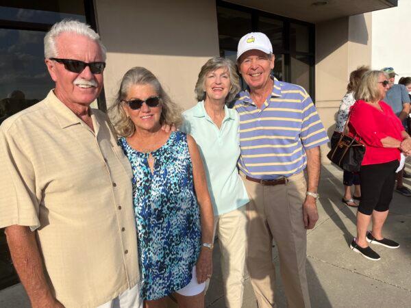 Fred Itson (L), Sheilah Itson (2L), and Barbara Spangler (2R) and Ron Spangler (R), all recent transplants to Florida, wait for Gov. Ron DeSantis to arrive at his book-signing in Leesburg, Fla., on Feb. 28, 2023. (Nanette Holt/The Epoch Times)