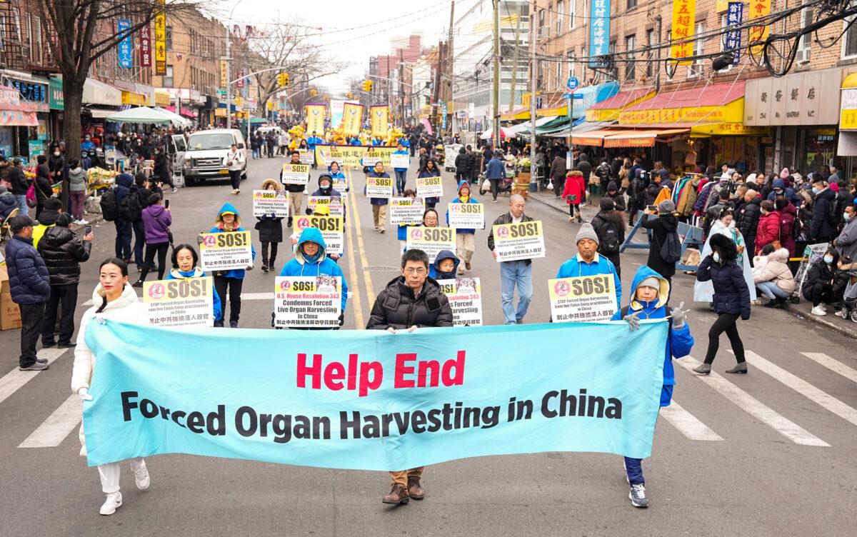 Falun Gong practitioners walk in a parade highlighting the Chinese regime's persecution of their faith, in Brooklyn, N.Y., on Feb. 26, 2023. (Larry Dye/The Epoch Times)