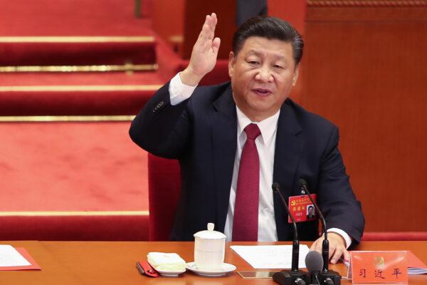 Chinese leader Xi Jinping votes at the closing of the 19th Communist Party Congress at the Great Hall of the People in Beijing on Oct. 24, 2017. (Lintao Zhang/Getty Images)