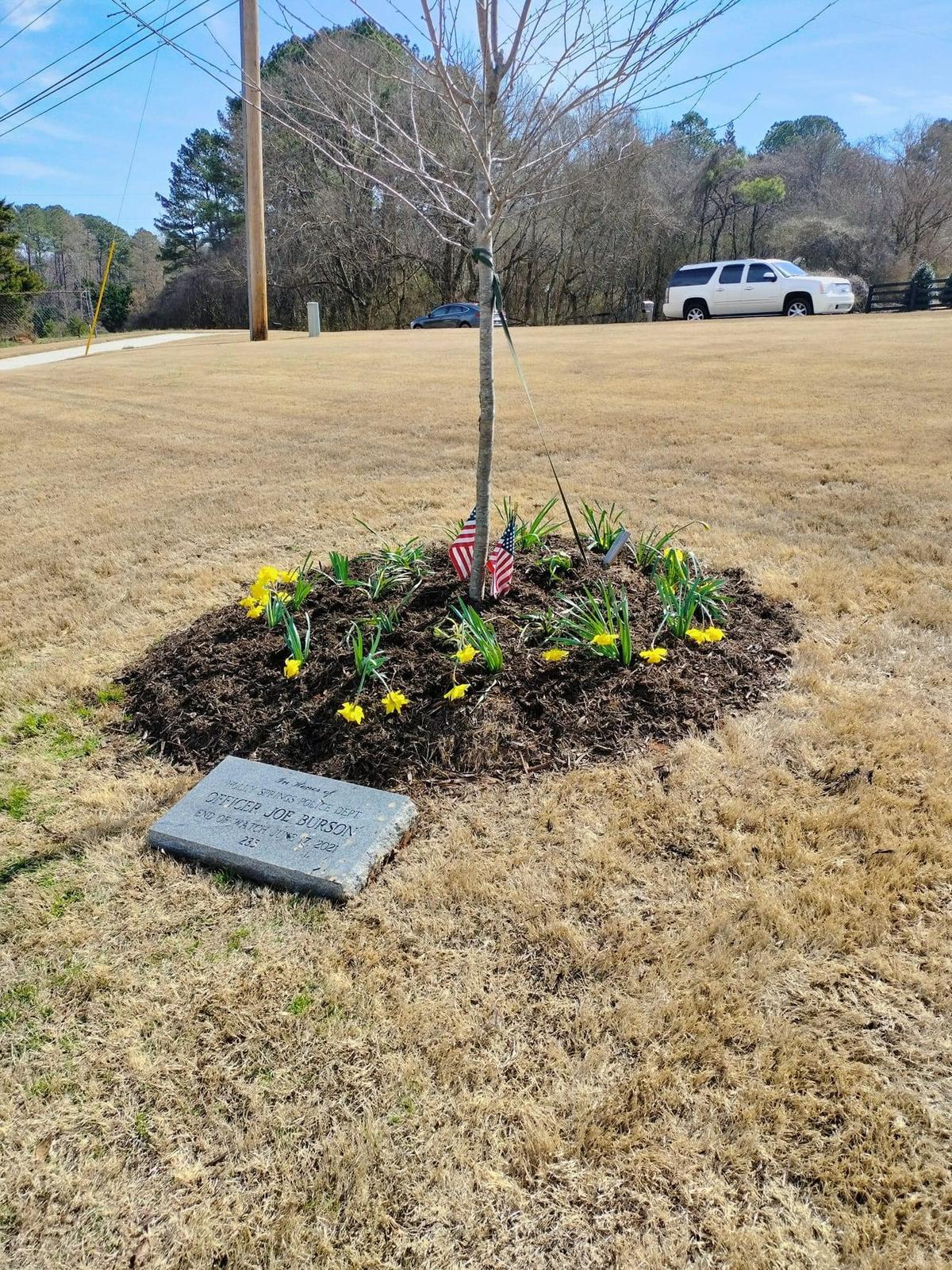 Officer Joe Burson's memorial, complete with the daffodils planted by the Chancer family. (Courtesy of Kristina Chancer)