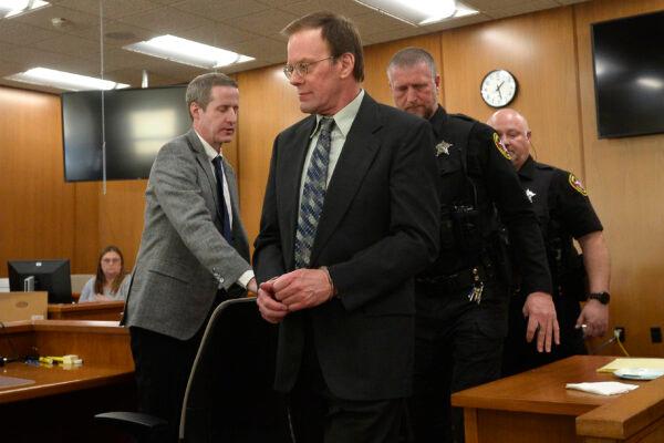 Mark Jensen (C) is led out of the courtroom after a guilty verdict in his trial at the Kenosha County Courthouse in Kenosha, Wis., on Feb. 1, 2023. (Sean Krajacic/The Kenosha News via AP, Pool)