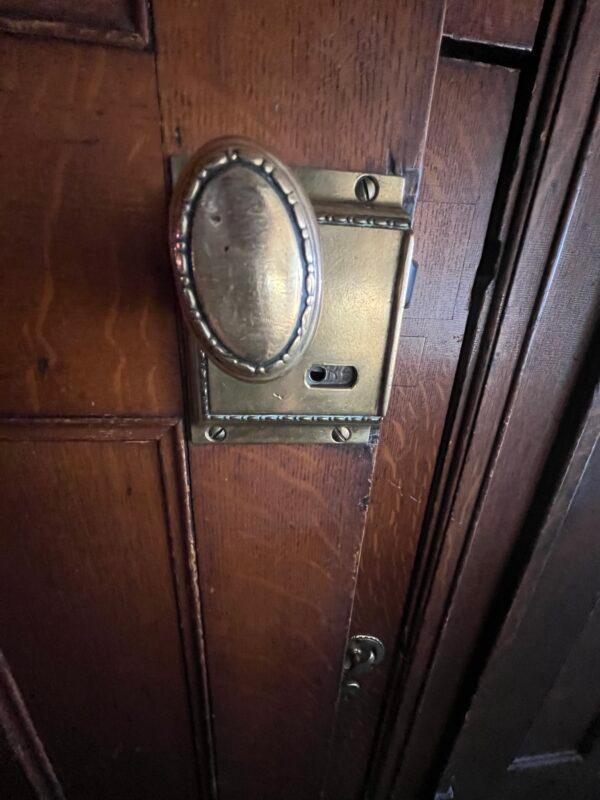 Adornments decorate even the smallest interior feature, like these brass door handles. (Courtesy of Deena Bouknight)