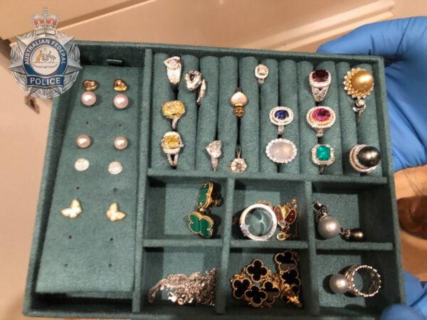 Police seized luxury jewellery and watches in the raids (supplied).