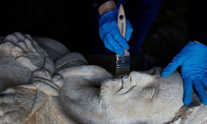 Roman Sewer Works Reveal Statue of Emperor Posing as Hercules