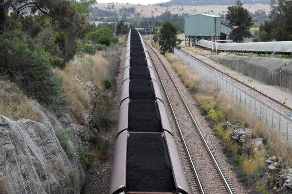 A train transports coal through the valleys of Singleton in New South Wales, Australia, on Nov. 4, 2021. (Saeed Khan/AFP via Getty Images)