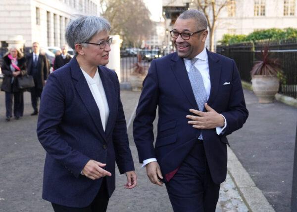 British Foreign Secretary James Cleverly welcomes Australian Foreign Minister Penny Wong ahead of a bilateral meeting at Carlton Gardens in London, England, on Feb. 1, 2023. (Stefan Rousseau-WPA Pool/Getty Images)