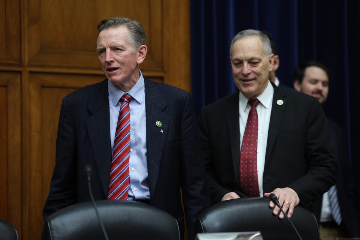 Rep. Paul Gosar (R-Ariz.) (L) and Rep. Andy Biggs (R-Ariz.) arrive for a House Oversight and Reform Committee meeting in the Rayburn House Office Building in Washington, on Jan. 31, 2023. (Kevin Dietsch/Getty Images)