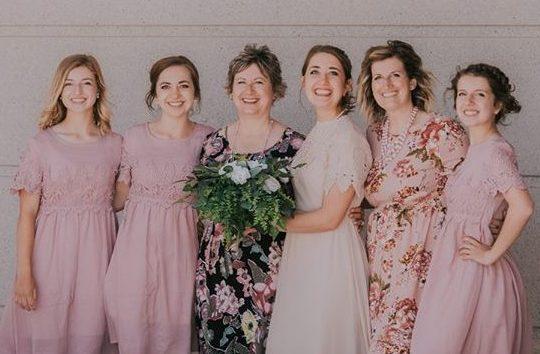 Counselor Peggy McFarland (3L) poses with some of her daughters and granddaughters at a family wedding in 2018. (Peggy McFarland)