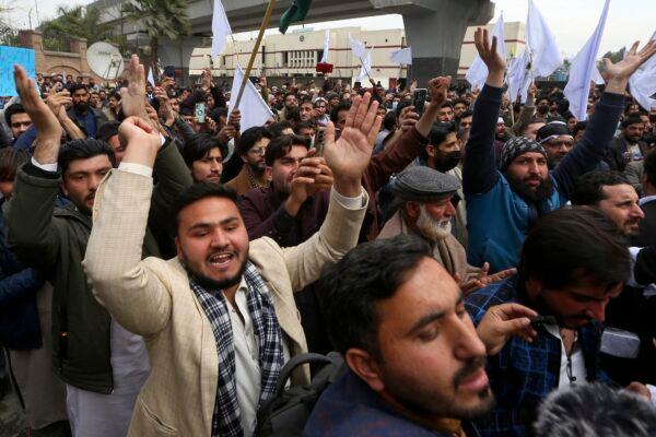 Supporters of Pakistan Tehreek-e-Insaf party take part in a rally denouncing terrorist attacks and demanding peace in the country in Peshawar, Pakistan, on Feb. 3, 2023. (Muhammad Sajjad/AP Photo)
