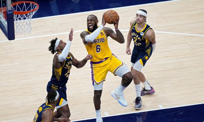 James Closes in on Scoring Record, Lakers Rally Past Pacers