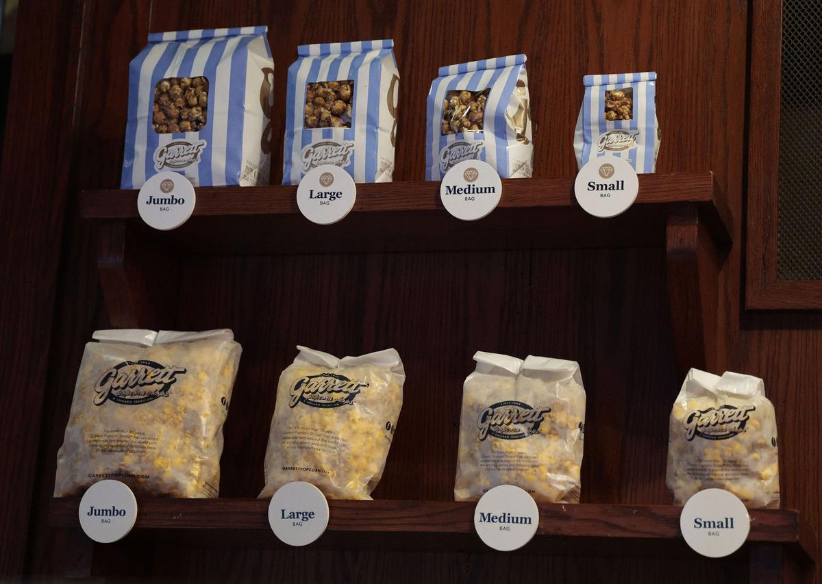 Assorted sizes of popcorn are on display at Garrett Popcorn Shops’ flagship store on Michigan Avenue on Jan. 12, 2023, in Chicago. (Antonio Perez/Chicago Tribune/TNS)