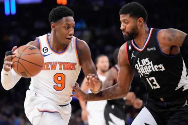 New York Knicks guard RJ Barrett (9) drives against Los Angeles Clippers guard Paul George (13) in the first half of an NBA basketball game, at Madison Square Garden in New York on Feb. 4, 2023. (Mary Altaffer/AP Photo)