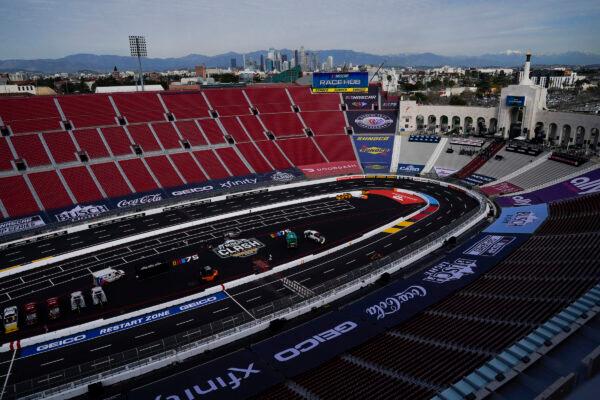 Downtown Los Angeles is seen from inside Los Angeles Memorial Coliseum ahead of a NASCAR exhibition auto race in Los Angeles Feb. 3, 2023. (AP Photo/Ashley Landis)
