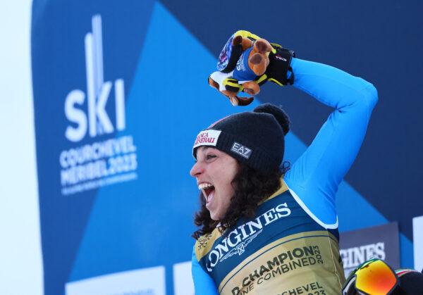 Italy's Federica Brignone celebrates on the podium after winning the Women's Alpine Combined at the Alpine Skiing FIS Alpine Ski World Cup-Women's Alpine Combined in Meribel, France, on Feb. 6, 2023. (Denis Balibouse/Reuters)