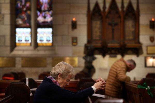  Parishioners pray at St Paul's Anglican Church in Sydney, Australia, on Oct. 25, 2020. (Lisa Maree Williams/Getty Images)
