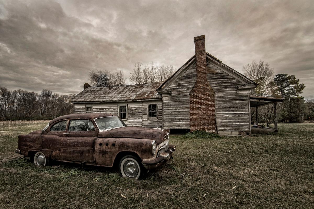An old car and home in Conway, North Carolina, photographed in December 2022. (Courtesy of Michael Wade)
