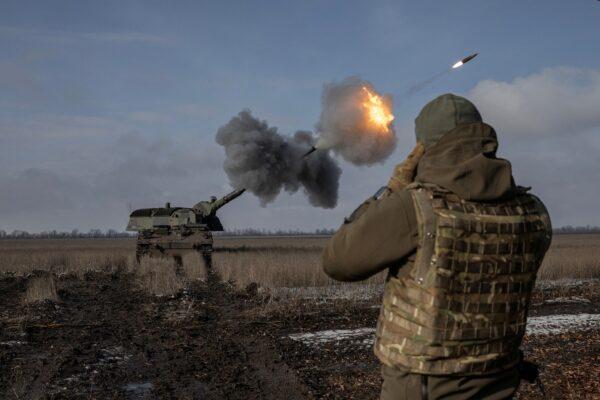 Ukrainian army from the 43rd Heavy Artillery Brigade fire the German howitzer Panzerhaubitze 2000, called Tina by the unit, near Bahmut, in Donetsk region, Ukraine, on Feb. 5, 2023, amid Russia's attack on Ukraine. (Marko Djurica TPX Images of the Day/Reuters)