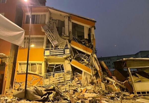 A collapsed building following an earthquake in Pazarcik, in Kahramanmaras Province, southern Turkey, early on Feb. 6, 2023. (Depo Photos via AP)
