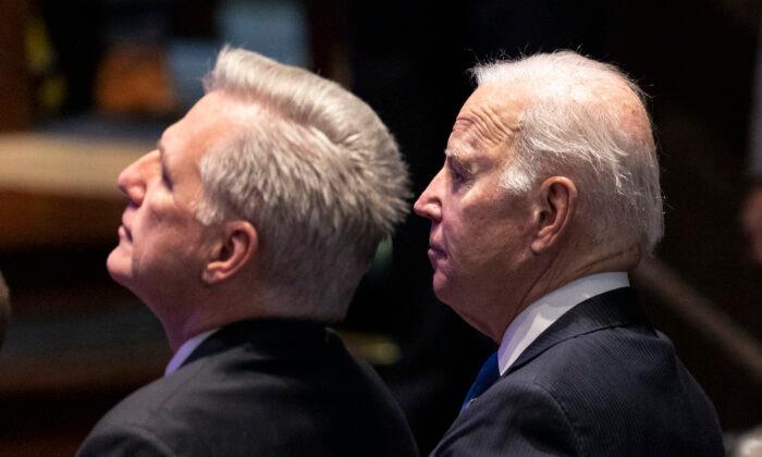 U.S. President Joe Biden (R) sits next to Speaker of the House Kevin McCarthy (R-Calif.) during the National Prayer Breakfast at the Capitol in Washington on Feb. 2, 2023. (Kevin Dietsch/Getty Images)